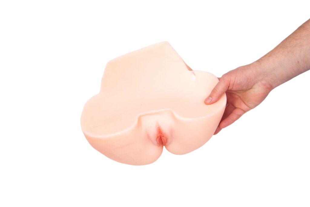 Masturbator pupa lili w rękach mężczyzny